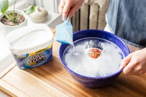 A dishwasher pod is the best "soapy scraper" for greasy oven doors