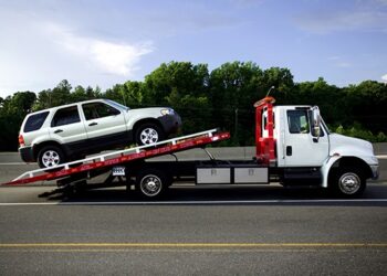 SUV on tow truck
