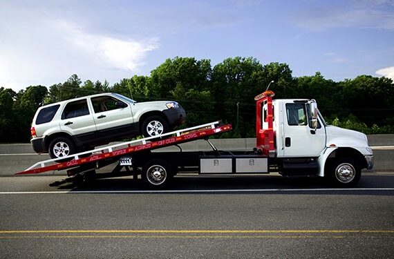 SUV on tow truck